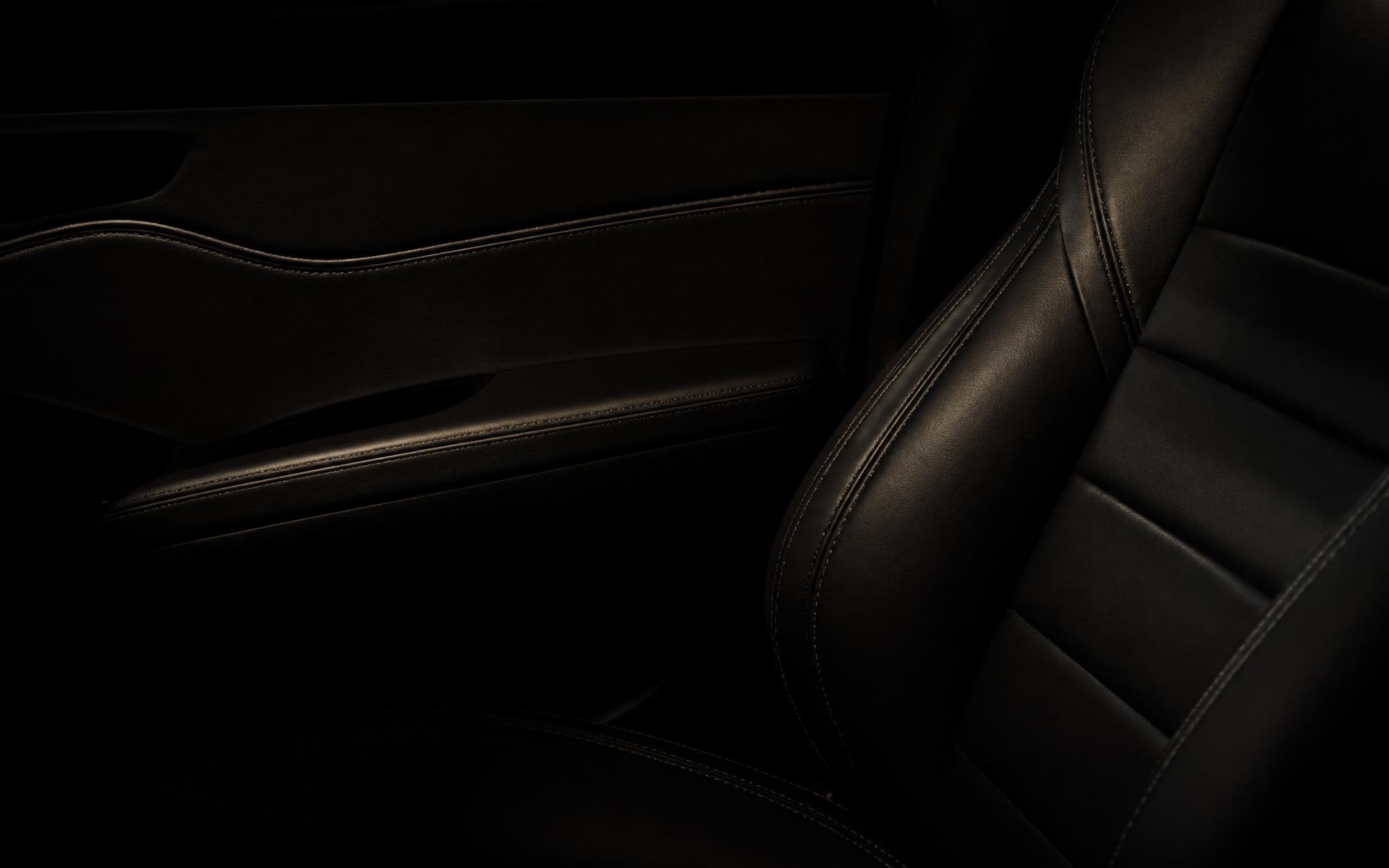 Interior detail of a high-end automobile in low light